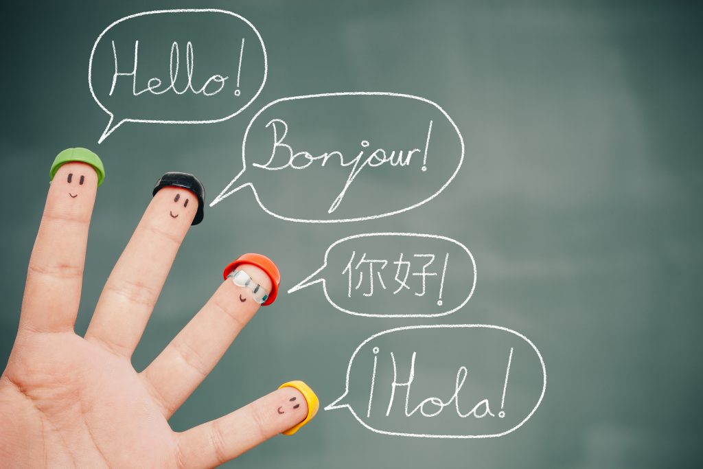 Four,Smiley,Fingers,On,A,Blackboard,Saying,Hello,In,English,